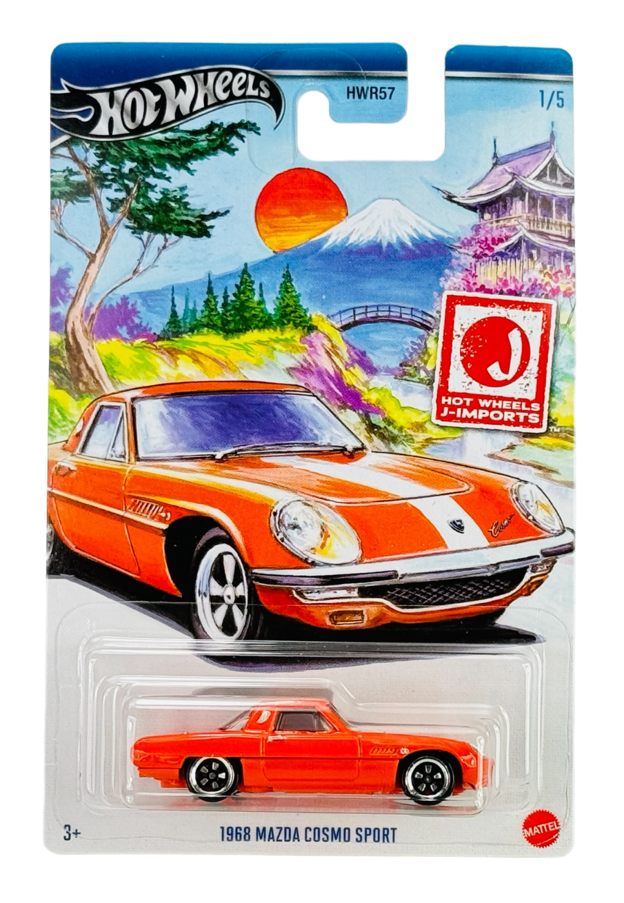Opakowanie modelu samochodu Hot Wheels z ilustracją pomarańczowego auta na tle krajobrazu z górą i świątynią. Na dole widoczny jest model samochodu z napisem \'1968 MAZDA COSMO SPORT\'.