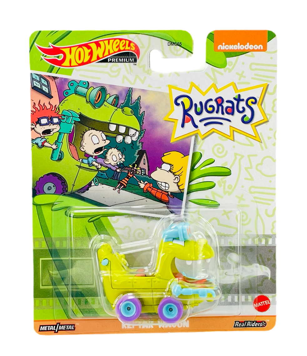 Opakowanie zabawki Hot Wheels z motywem kreskówki \'Rugrats\', zawierające żółty pojazd z niebieskimi elementami i fioletowymi kołami. Widoczne logo \'Nickelodeon\' oraz \'Mattel\'.