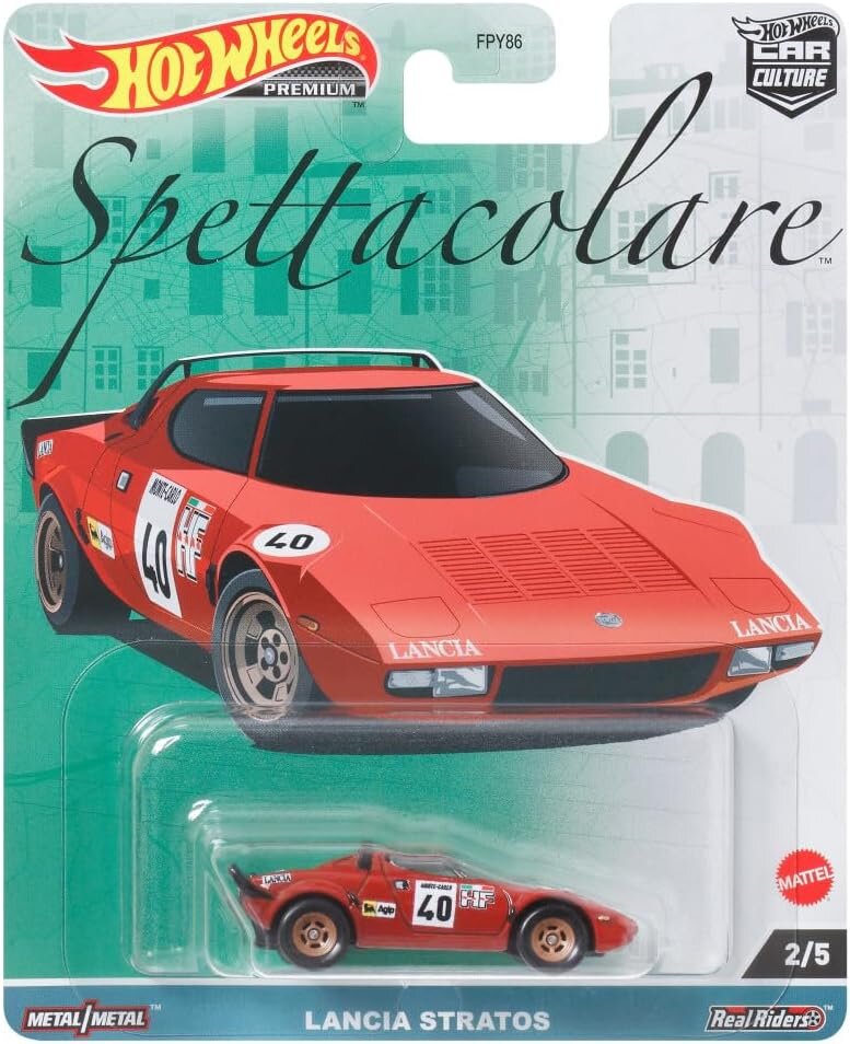 Opakowanie z modelem samochodu Hot Wheels Premium, przedstawiające czerwony samochód Lancia Stratos z numerem 40. Na opakowaniu widoczne są napisy: \'Spettacolare\', \'Lancia Stratos\', \'Metal/Metal\', \'Real Riders\', oraz logo Hot Wheels i Mattel.