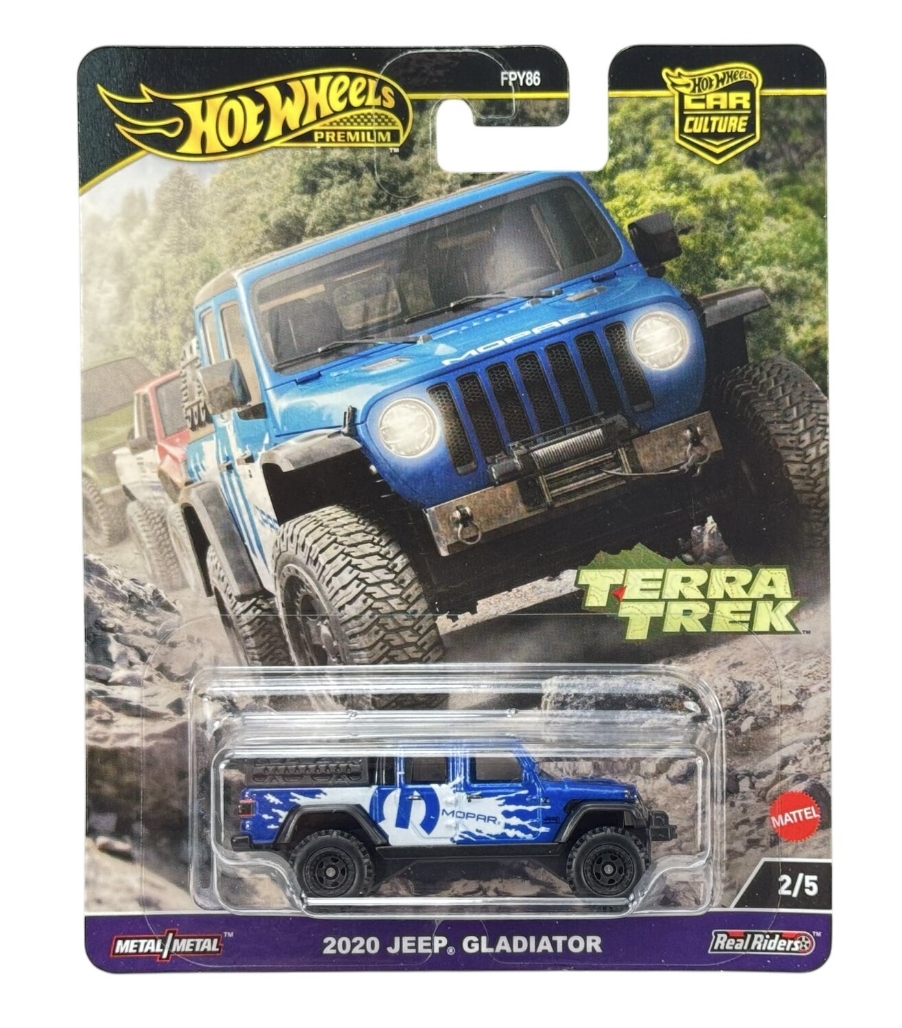 Opakowanie z modelem samochodu Hot Wheels Premium, przedstawiające niebieski pojazd terenowy z napisem \'MOPAR\'. Widoczne napisy to \'2020 JEEP GLADIATOR\', \'TERRA TREK\', \'Metal/Metal\', \'Real Riders\', \'2/5\', oraz logo Hot Wheels i Mattel.
