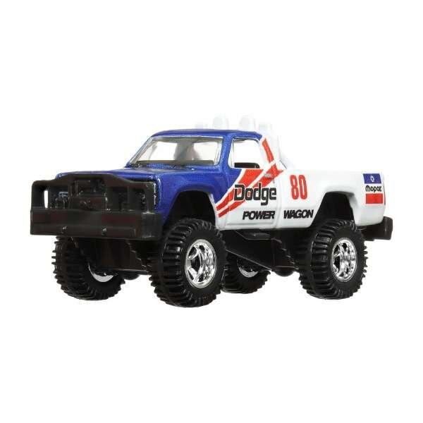 Model samochodu terenowego w kolorach niebieskim i białym z napisami \'Dodge\', \'Power\', \'Wagon\' oraz numerem \'80\'. Posiada duże, terenowe opony i detale w postaci czerwonych pasków oraz logo \'mopar\'.