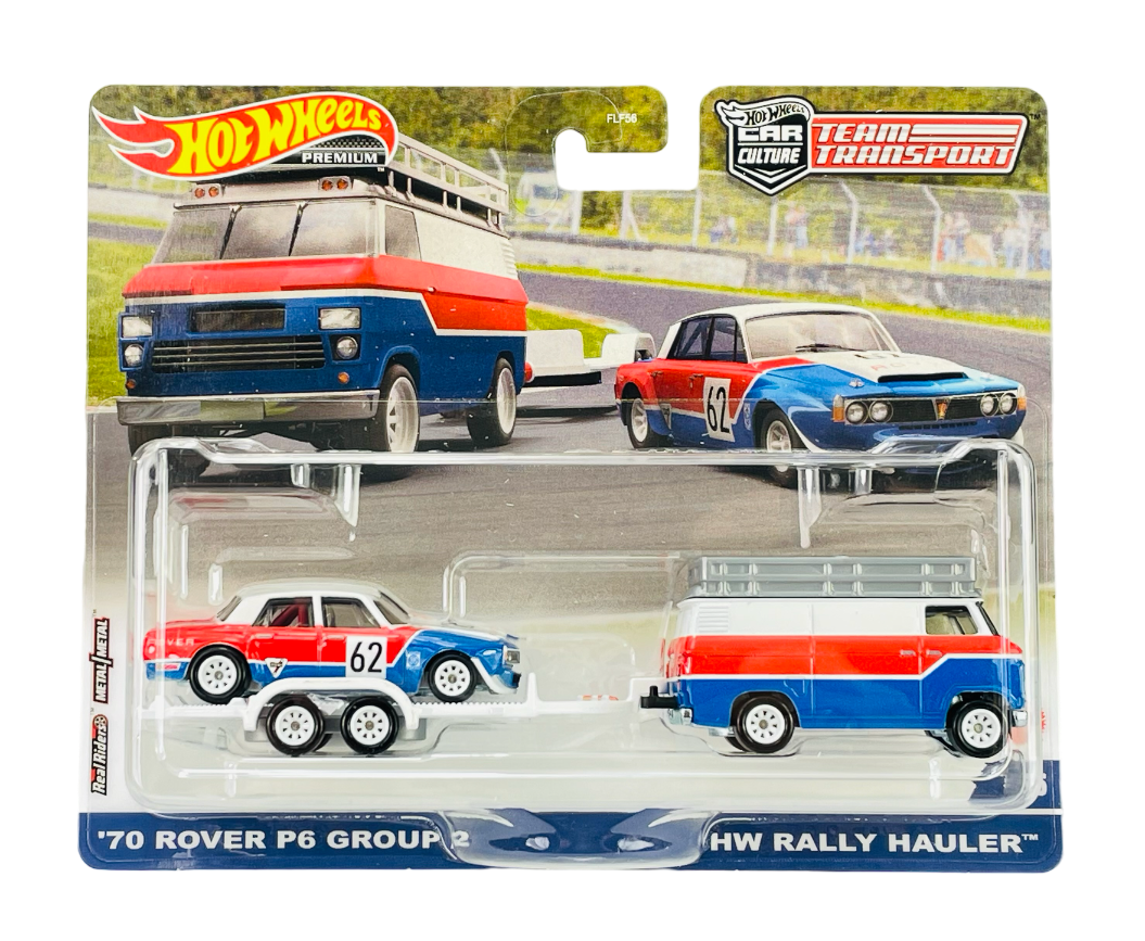 Opakowanie z modelami samochodów Hot Wheels Premium, przedstawiające \'70 Rover P6 Group 2 i HW Rally Hauler w kolorach czerwonym, niebieskim i białym. Na opakowaniu widnieje napis: \'70 Rover P6 Group 2 + HW Rally Hauler\'.