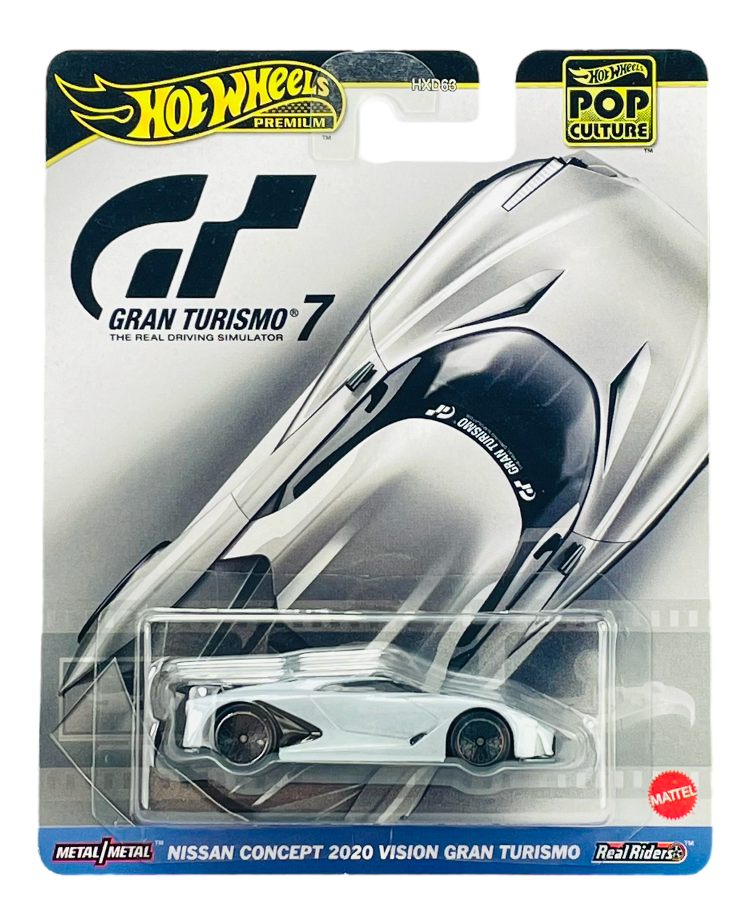 Opakowanie modelu samochodu Hot Wheels Premium z serii Pop Culture, przedstawiające Nissan Concept 2020 Vision Gran Turismo. Na opakowaniu widoczne są napisy: \'Gran Turismo 7\', \'Metal/Metal\', \'Real Riders\' oraz logo Mattel.