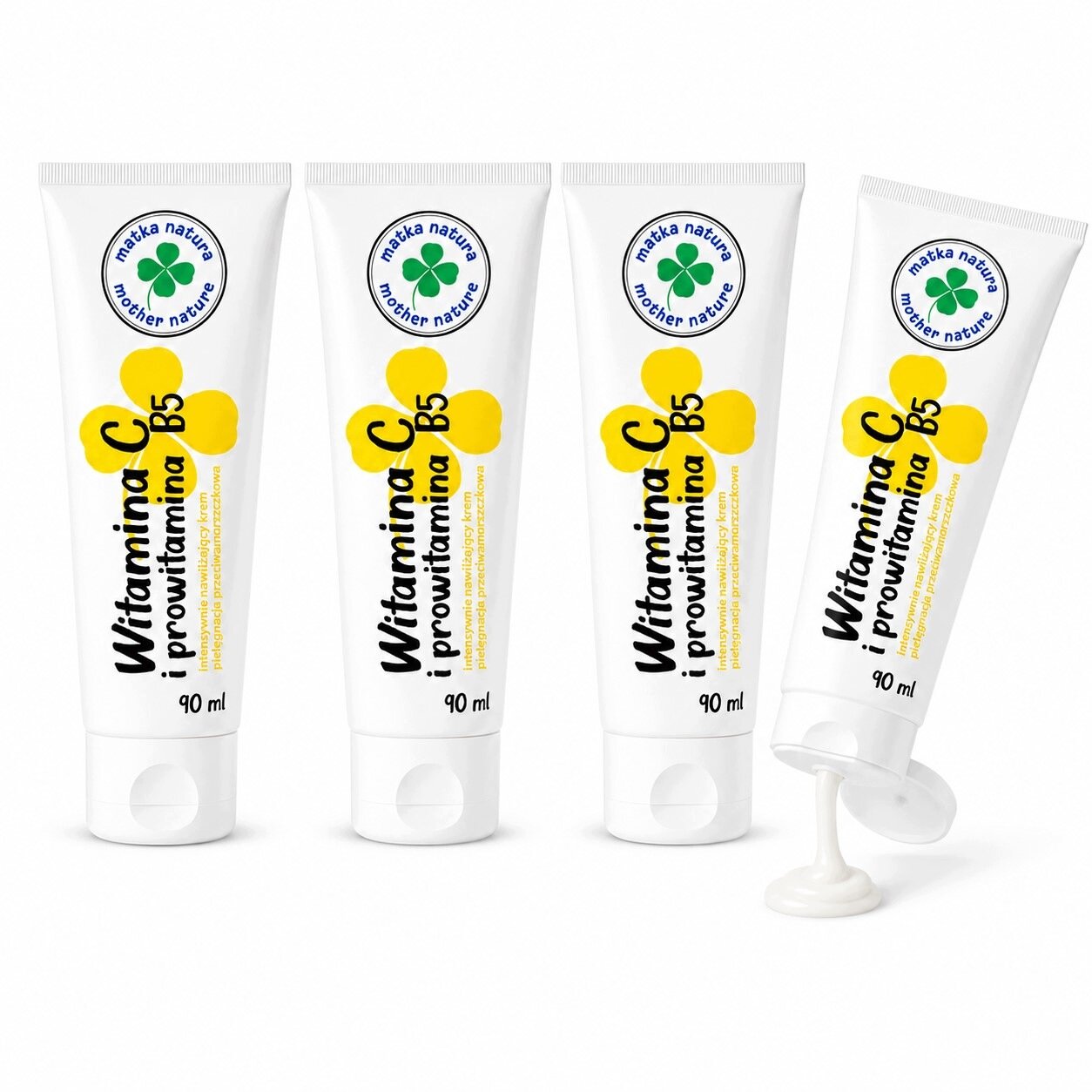 Na obrazie widoczne są cztery tubki kremu z napisem \'Witamina C i prowitamina B5 90 ml\'. Na każdej tubce znajduje się logo z napisem \'matka natura mother nature\'.