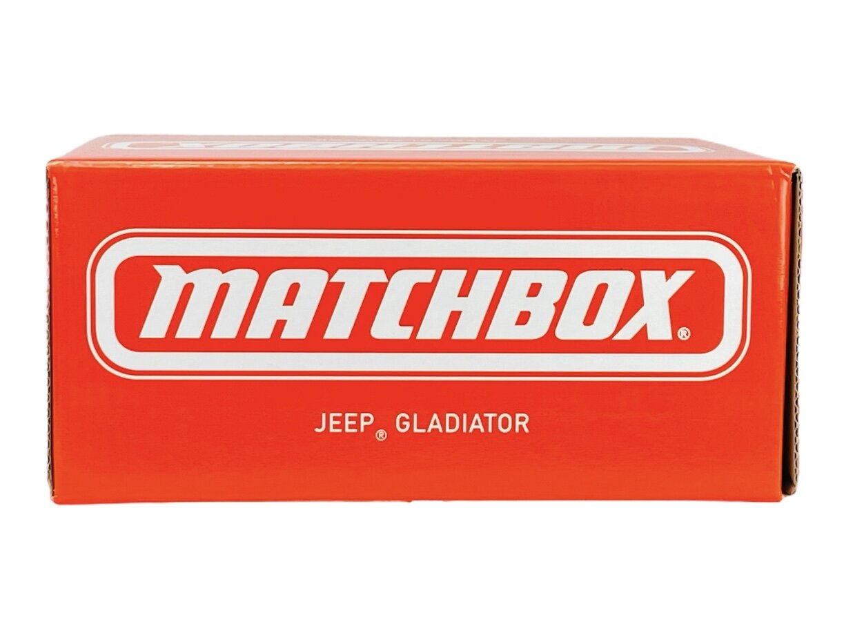 Czerwone pudełko z białym logo \'MATCHBOX\' oraz napisem \'JEEP GLADIATOR\'.