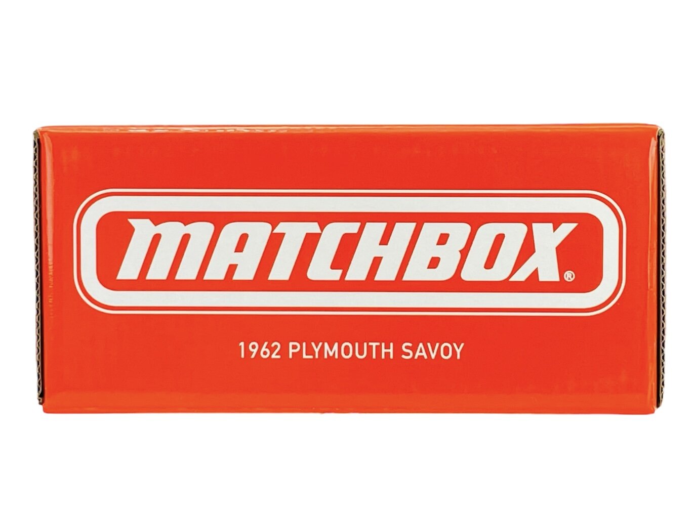 Czerwone pudełko z białym logo \'MATCHBOX\' oraz napisem \'1962 PLYMOUTH SAVOY\'.