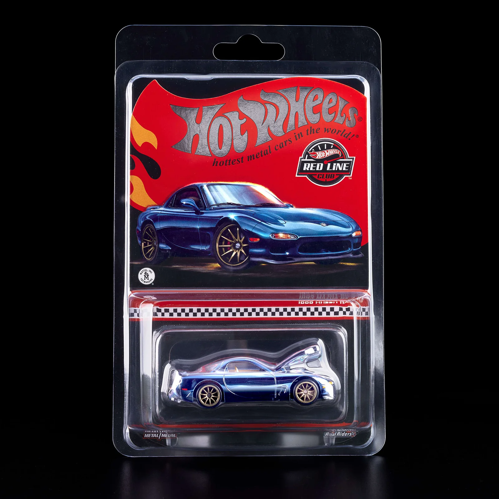 Opakowanie z modelem samochodu Hot Wheels, przedstawiające niebieski samochód sportowy. Na górze widoczne jest logo \'Hot Wheels\' oraz napis \'hottest metal cars in the world\'.