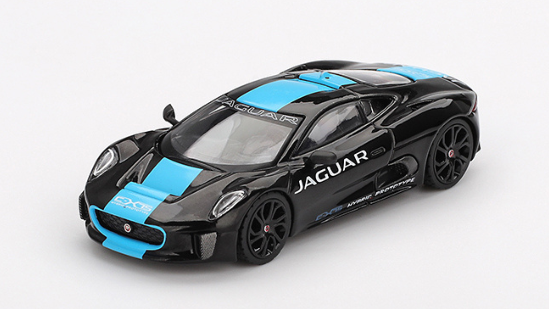 Model samochodu w kolorze czarnym z niebieskimi akcentami, z widocznym napisem \'JAGUAR\' na boku. Na masce i dachu znajdują się dodatkowe napisy oraz logo producenta.
