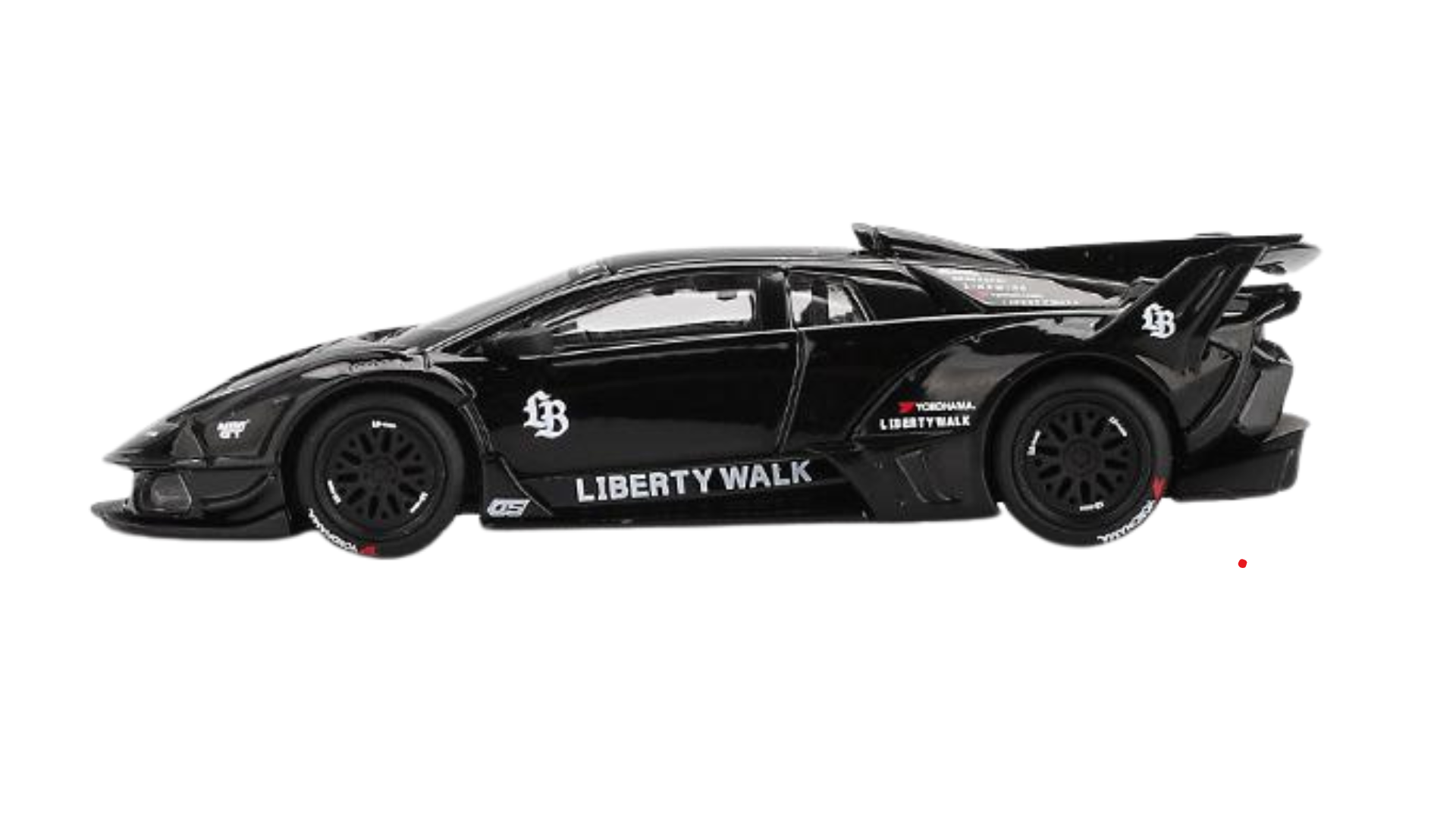 Czarny model samochodu sportowego z widocznymi napisami \'LIBERTY WALK\' i logo \'LB\' na boku. Samochód ma duży tylny spojler i szczegółowe felgi.