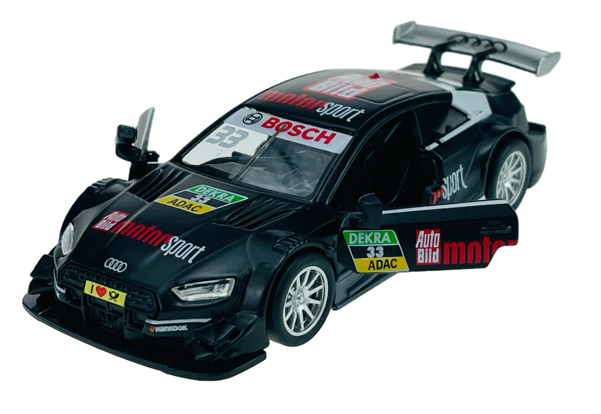 Czarny model samochodu wyścigowego z otwartymi drzwiami, ozdobiony licznymi logotypami, w tym \'Auto Bild motorsport\', \'BOSCH\', \'DEKRA\', \'ADAC\'. Na masce widoczne jest logo Audi oraz napis \'Hankook\'.
