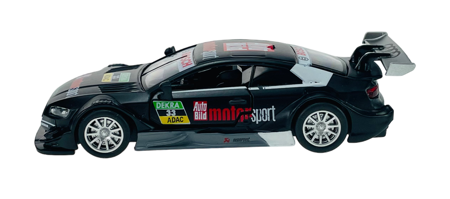 Czarny model samochodu wyścigowego z widocznymi naklejkami \'DEKRA 33 ADAC\' i \'Auto Bild motorsport\'. Samochód ma duży tylny spojler i srebrne felgi.