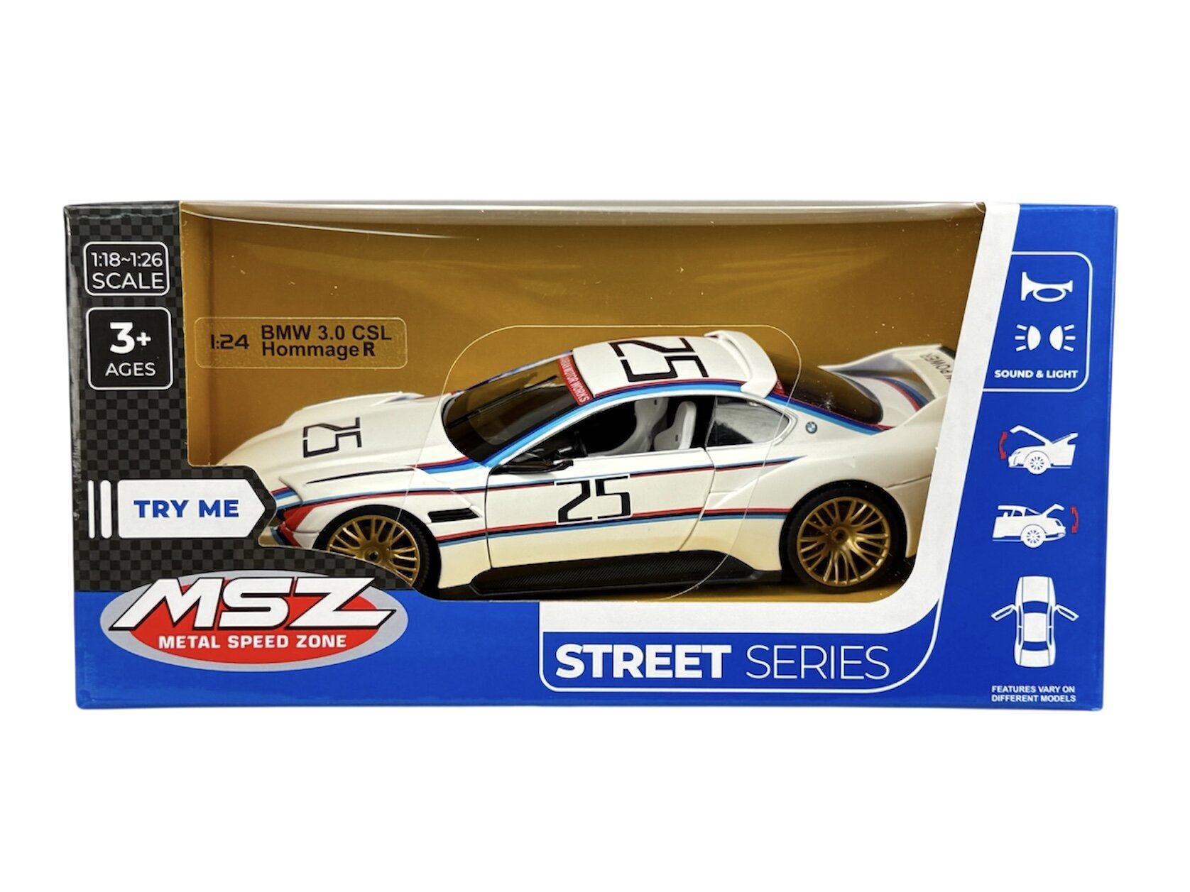 Opakowanie modelu samochodu BMW 3.0 CSL Hommage R w skali 1:24, z widocznym białym modelem samochodu z numerem 25 na boku. Na opakowaniu znajdują się napisy: \'MSZ METAL SPEED ZONE\', \'STREET SERIES\', \'TRY ME\', oraz ikony wskazujące na funkcje dźwięku i światła.
