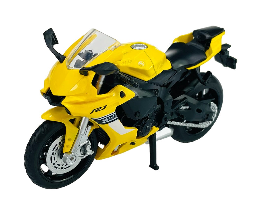 Żółty model motocykla z czarnymi i srebrnymi elementami, oznaczony napisami \'R1\' i \'Yamaha\'. Motocykl posiada szczegółowe elementy, takie jak lusterka, koła i układ wydechowy.