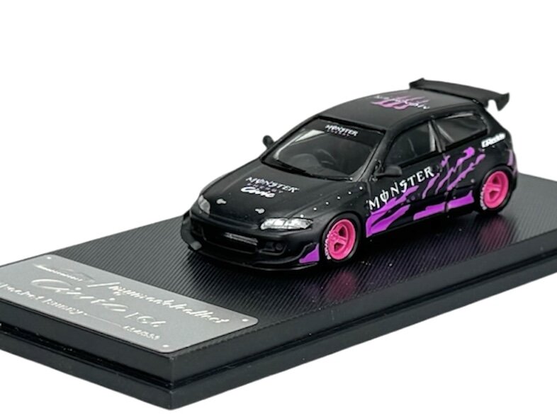 Model samochodu w skali 1:64 w kolorze czarno-fioletowym z różowymi felgami, umieszczony na podstawce z napisem \'Civic\'. Na karoserii widoczne są napisy \'MONSTER\' i \'MONSTER CABLE\'.