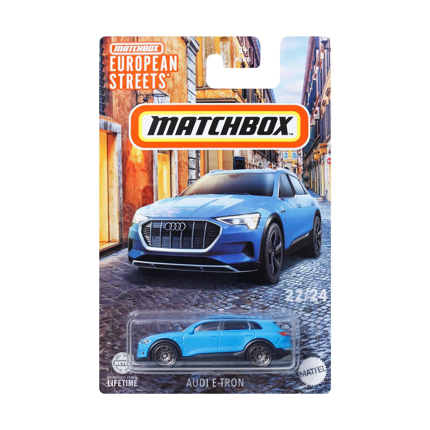 Opakowanie z modelem samochodu Matchbox przedstawiające niebieski Audi E-Tron na tle europejskiej ulicy. Widoczne napisy: \'Matchbox European Streets\', \'22/24\', \'Audi E-Tron\', \'Mattel\'.