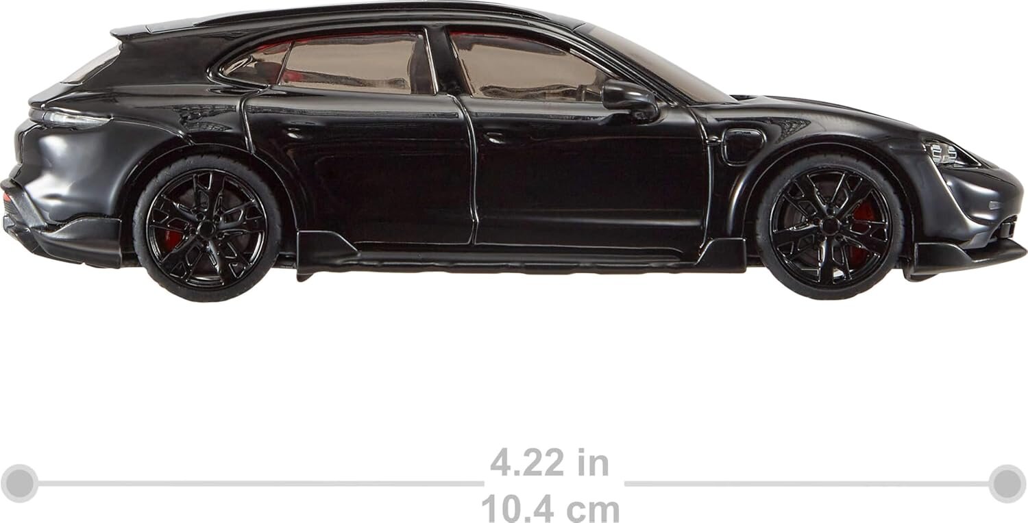 Model samochodu w kolorze czarnym z czerwonymi elementami na felgach. Pod spodem widoczny jest tekst: \'4.22 in 10.4 cm\'.