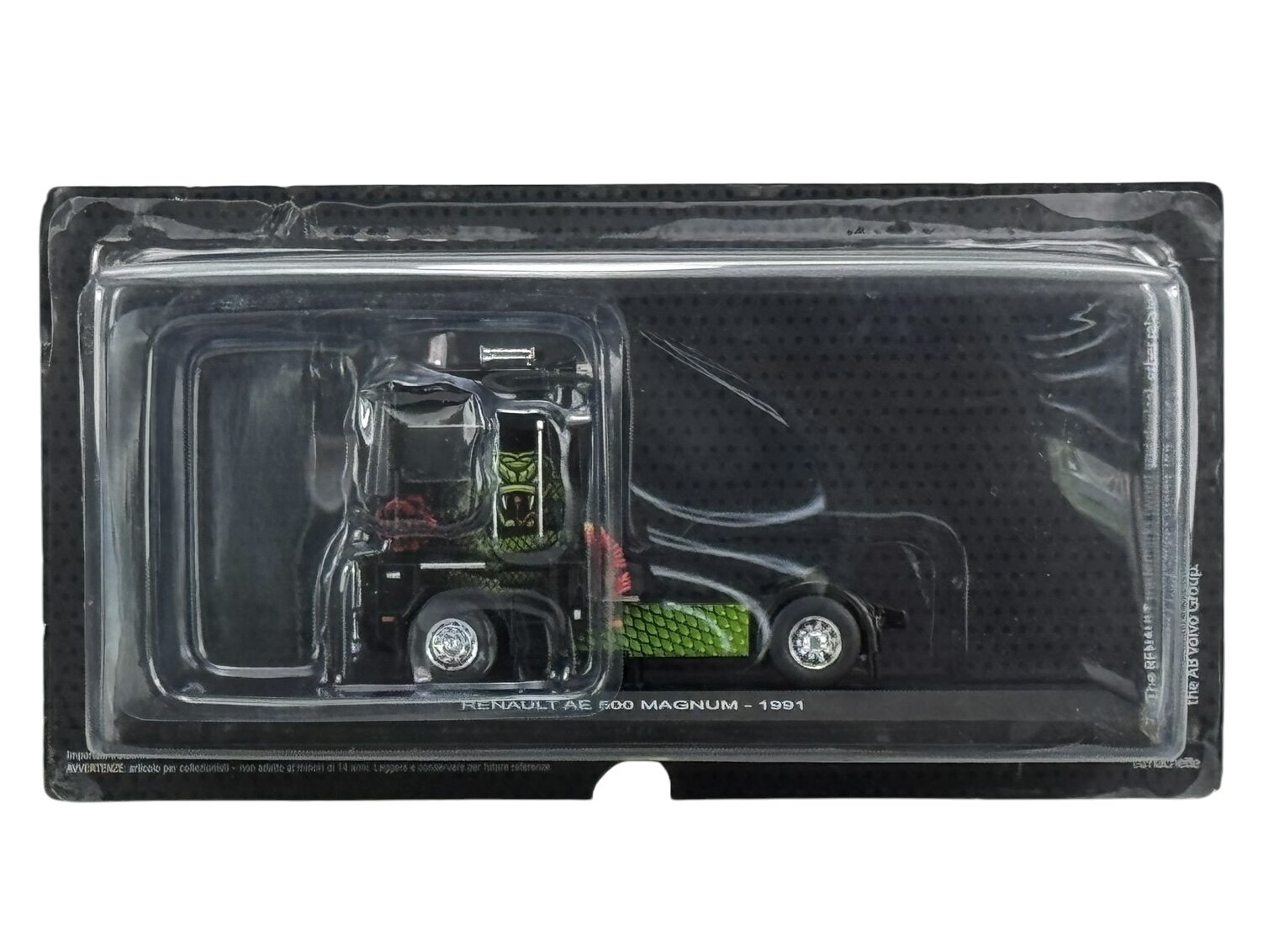 Model ciężarówki Renault AE 500 Magnum z 1991 roku w skali 1:43, zapakowany w przezroczyste opakowanie. Na opakowaniu widoczny jest napis \'RENAULT AE 500 MAGNUM - 1991\'.