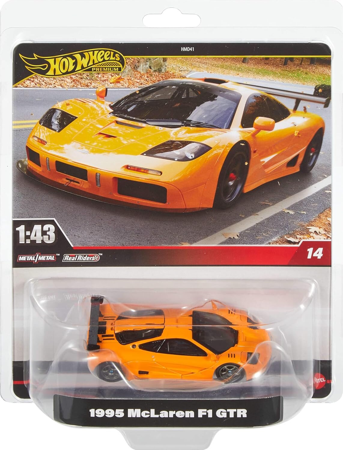 Opakowanie z modelem samochodu w skali 1:43, przedstawiające pomarańczowy samochód wyścigowy. Na opakowaniu widnieje napis \'1995 McLaren F1 GTR\'.
