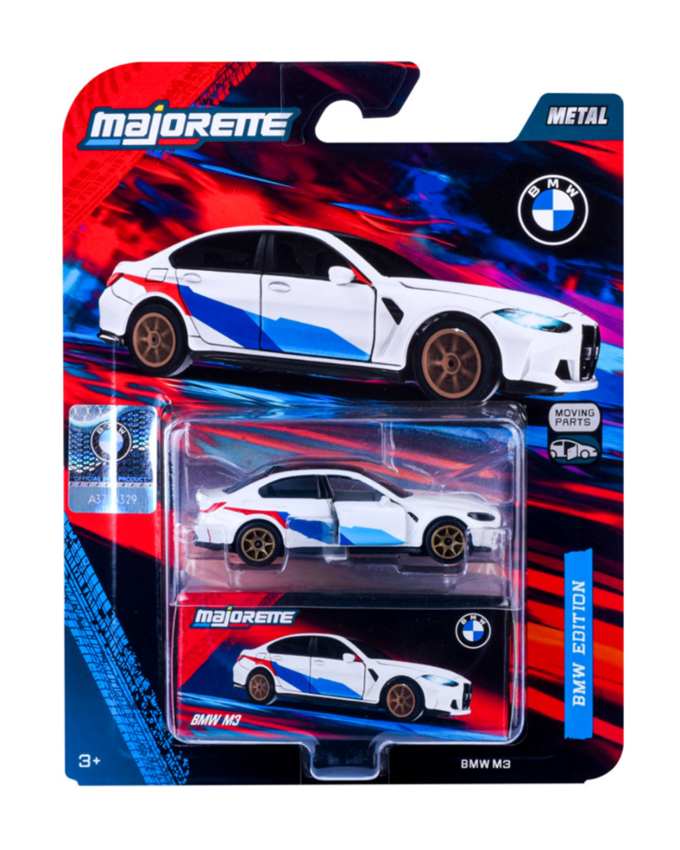 Opakowanie z metalowym modelem samochodu BMW M3 w skali 1:64, w kolorze białym z niebieskimi i czerwonymi akcentami oraz złotymi felgami. Widoczne logo Majorette i BMW, a także napis \'BMW EDITION\'.