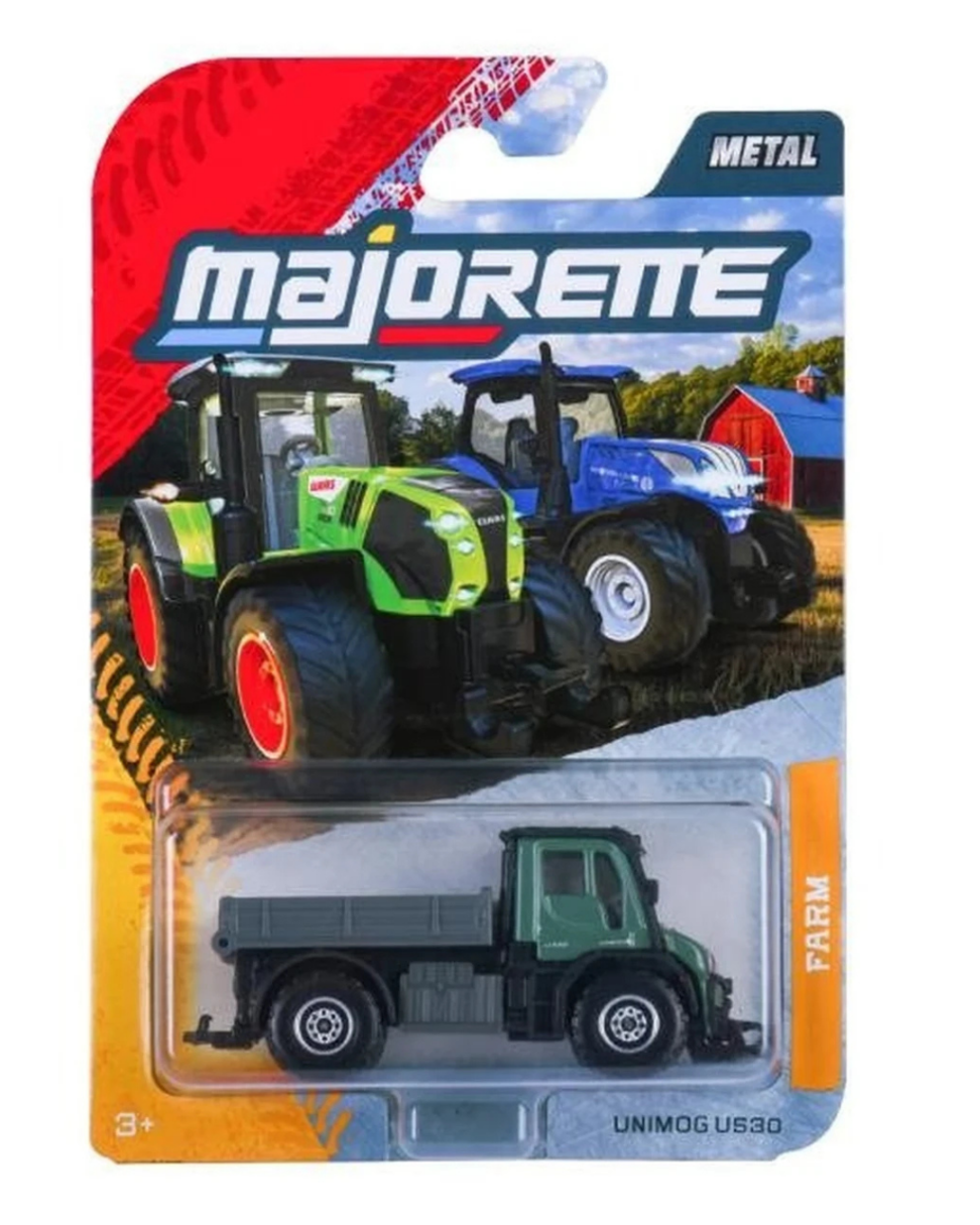 Opakowanie z metalowym modelem pojazdu Unimog U530 w kolorze zielonym. Na górze widoczne jest logo \'Majorette\' oraz napis \'METAL\'.