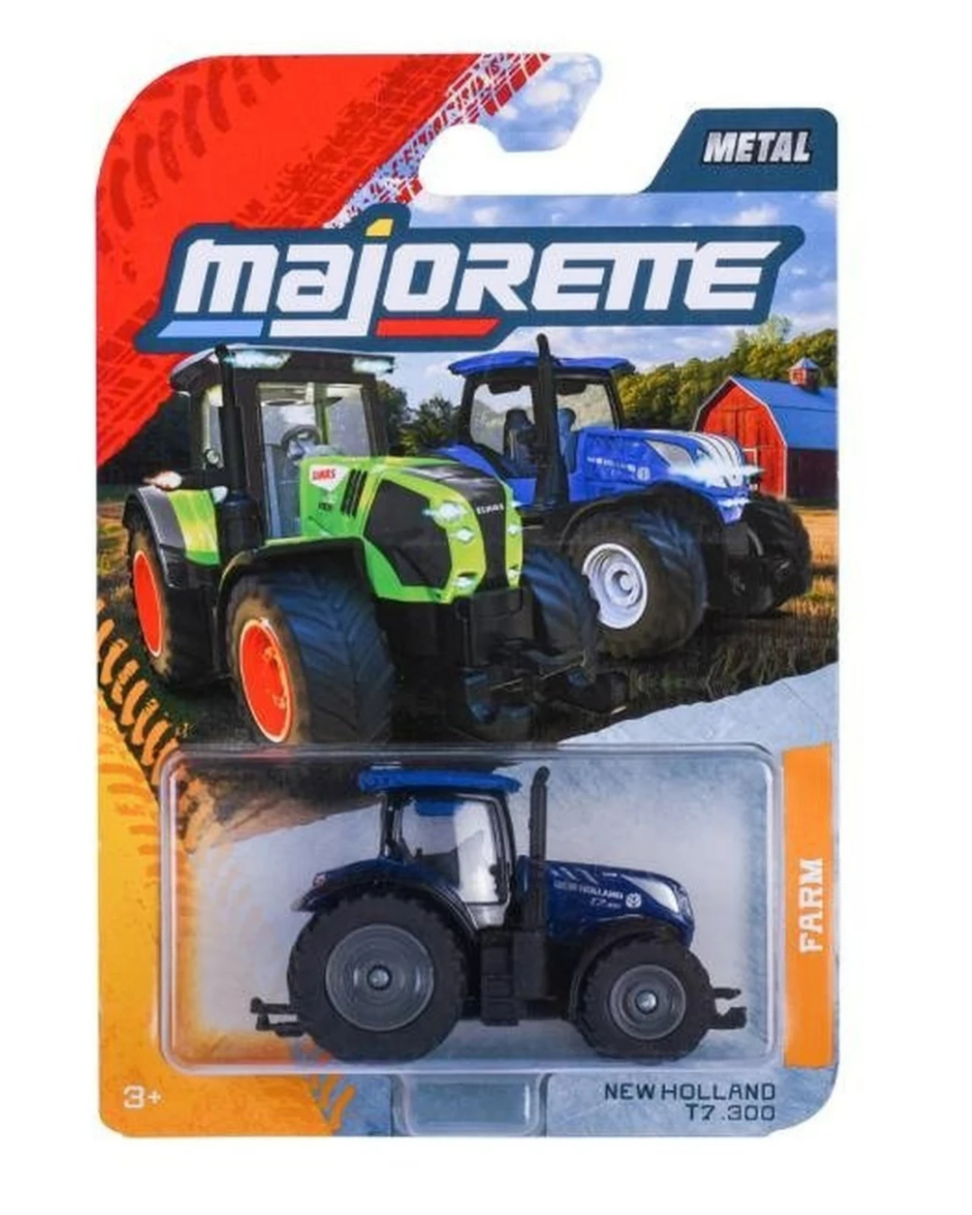 Opakowanie z metalowym modelem niebieskiego traktora New Holland T7.300, z widocznym logo \'Majorette\' i napisem \'METAL\'.