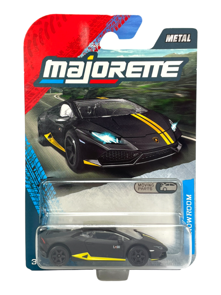 Opakowanie z metalowym modelem samochodu Lamborghini Huracan Avio 1:64, z widocznym logo \'majorette\' i napisem \'METAL\'. Model jest czarny z żółtymi detalami i znajduje się w przezroczystym pudełku.