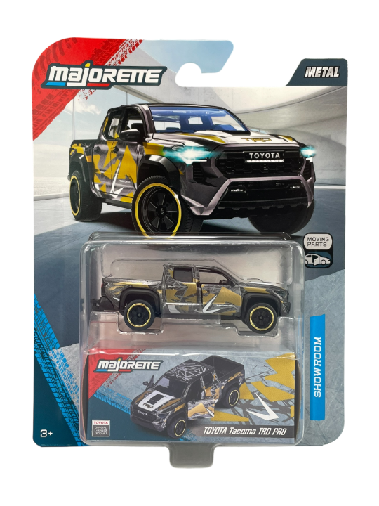 Opakowanie z metalowym modelem samochodu Majorette, przedstawiające Toyota Tacoma TRD PRO w skali 1:64. Na opakowaniu widoczne są napisy: \'Majorette\', \'TOYOTA Tacoma TRD PRO\', \'SHOWROOM\' oraz \'METAL\'.