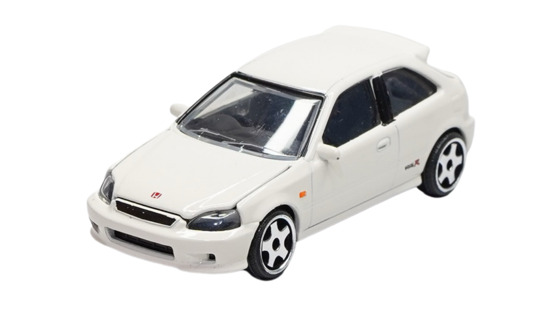 Biały model samochodu w skali 1:64 z czarnymi szybami i detalami, takimi jak logo na masce i czarne felgi. Na boku widoczny jest napis \'Type R\'.