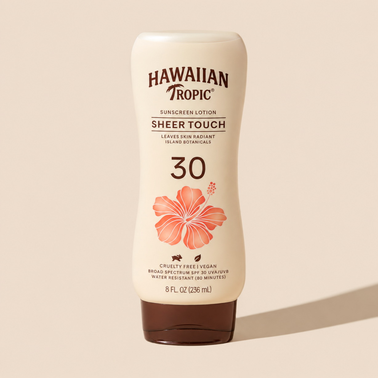 Butelka kremu przeciwsłonecznego z napisem \'HAWAIIAN TROPIC SHEER TOUCH 30\'. Na opakowaniu widoczny jest rysunek kwiatu oraz informacje o pojemności 8 FL. OZ (236 mL) i właściwościach produktu.