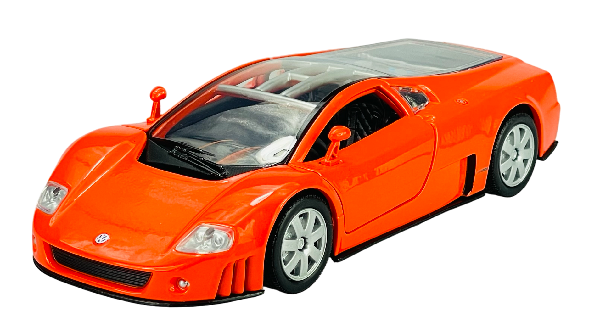 Pomarańczowy model samochodu sportowego z widocznym logo VW na przodzie, posiada przezroczysty dach i srebrne felgi.