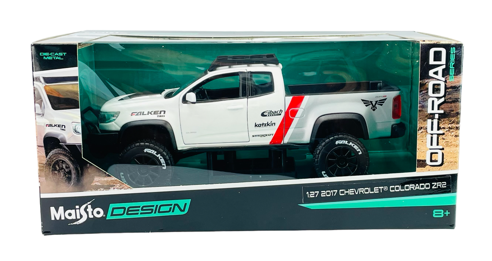 Model samochodu Maisto Design 2017 Chevrolet Colorado ZR2 w kolorze białym, umieszczony w przezroczystym opakowaniu z napisami \'OFF-ROAD SERIES\' i \'1:27 2017 CHEVROLET COLORADO ZR2\'. Na opakowaniu widoczne są również logotypy \'Falken\', \'Eibach\', \'katkin\' oraz \'Maisto DESIGN\'.