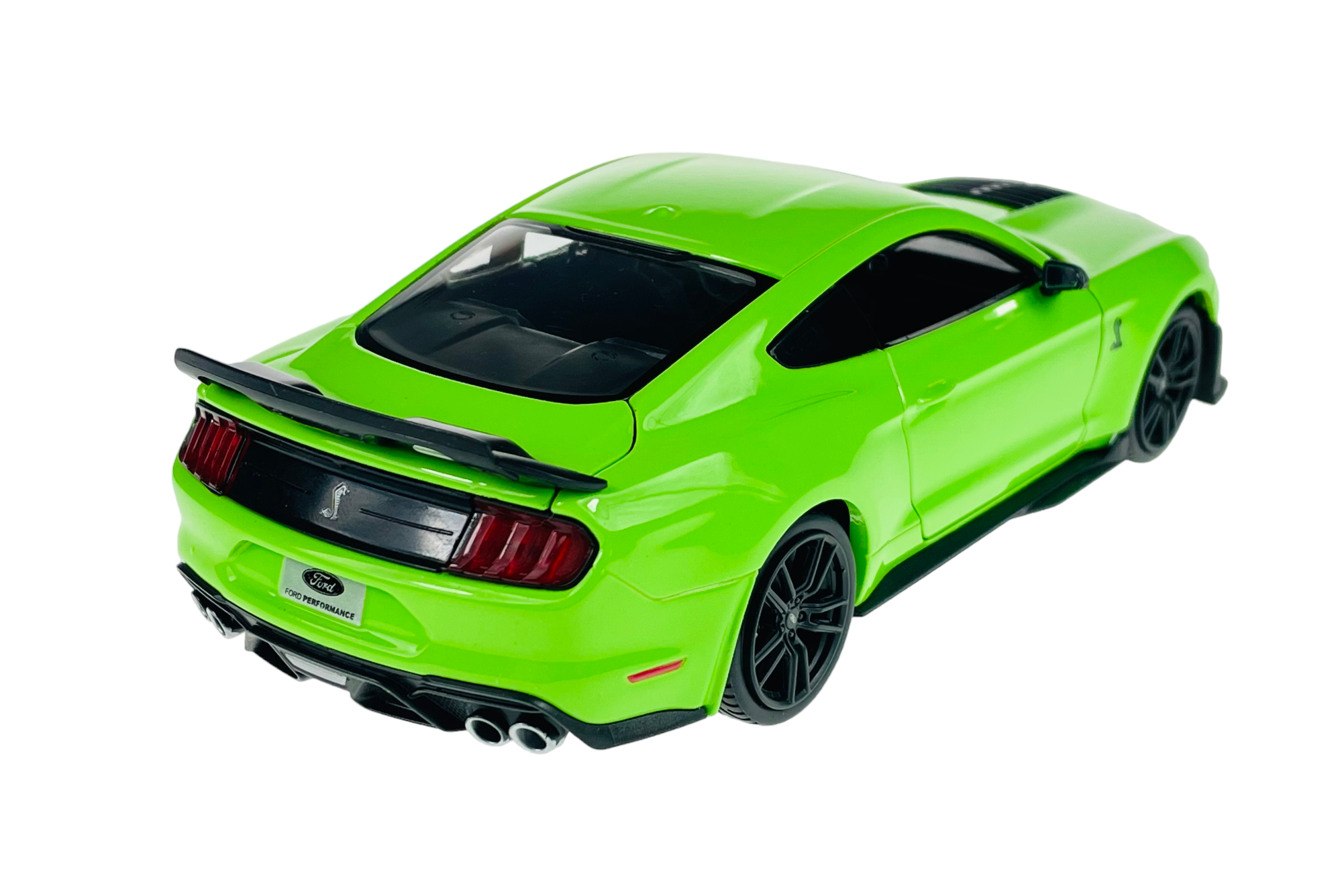Model samochodu w kolorze zielonym z czarnymi elementami, widoczny z tyłu. Na tablicy rejestracyjnej znajduje się napis \'Ford Performance\'.