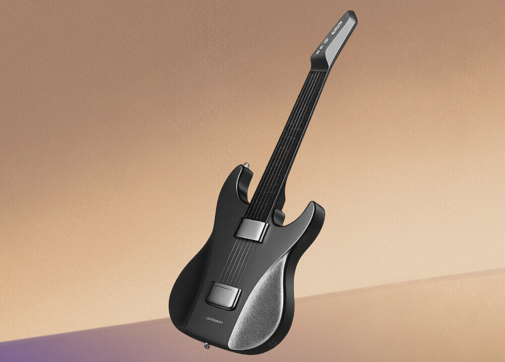 Czarna gitara o nowoczesnym designie z widocznymi strunami i srebrnymi elementami. Na korpusie znajduje się napis \'AEROBAND\'.