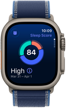 Smartwatch z tytanową kopertą i granatowym paskiem, wyświetlający wynik snu 84 oraz napis \'High\' z datą \'Mar 31 – Apr 1\'. Na ekranie widoczna jest godzina 10:09 i napis \'Sleep Score\'.