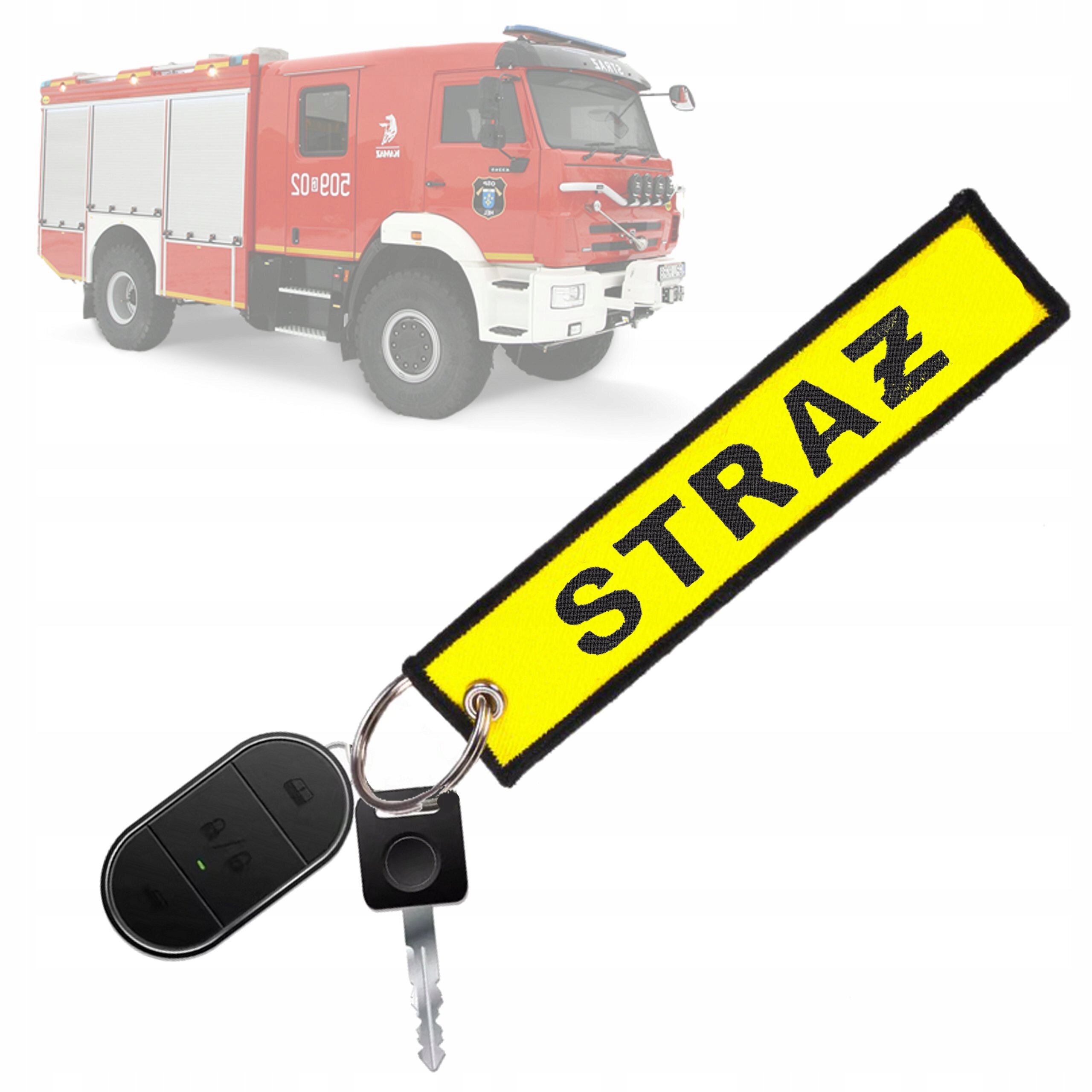 Na obrazie widoczny jest czerwony wóz strażacki oraz żółty brelok z napisem \'STRAŻ\' przymocowany do klucza i pilota.