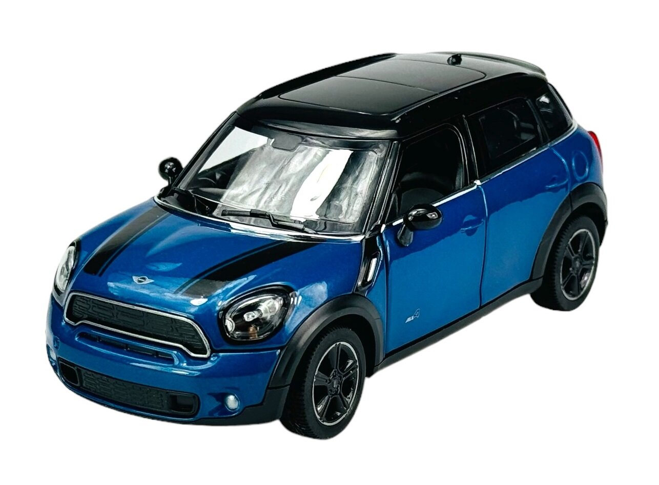Niebieski model samochodu Mini Cooper S Countryman z czarnym dachem i czarnymi pasami na masce. Samochód ma czarne felgi i widoczne logo producenta na masce.