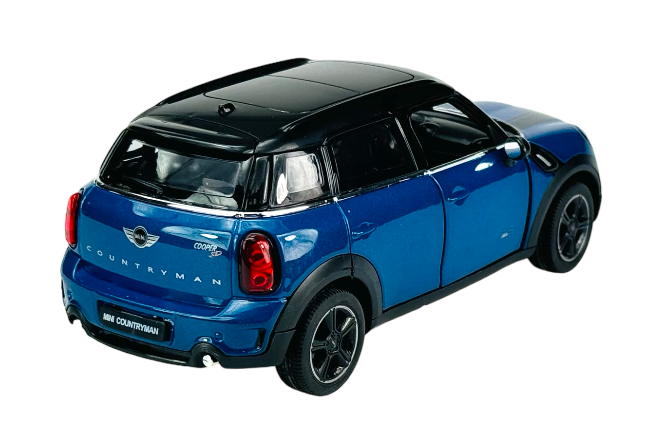 Model samochodu w kolorze niebieskim z czarnym dachem, oznaczony napisami \'MINI COUNTRYMAN\' i \'COOPER S\'.