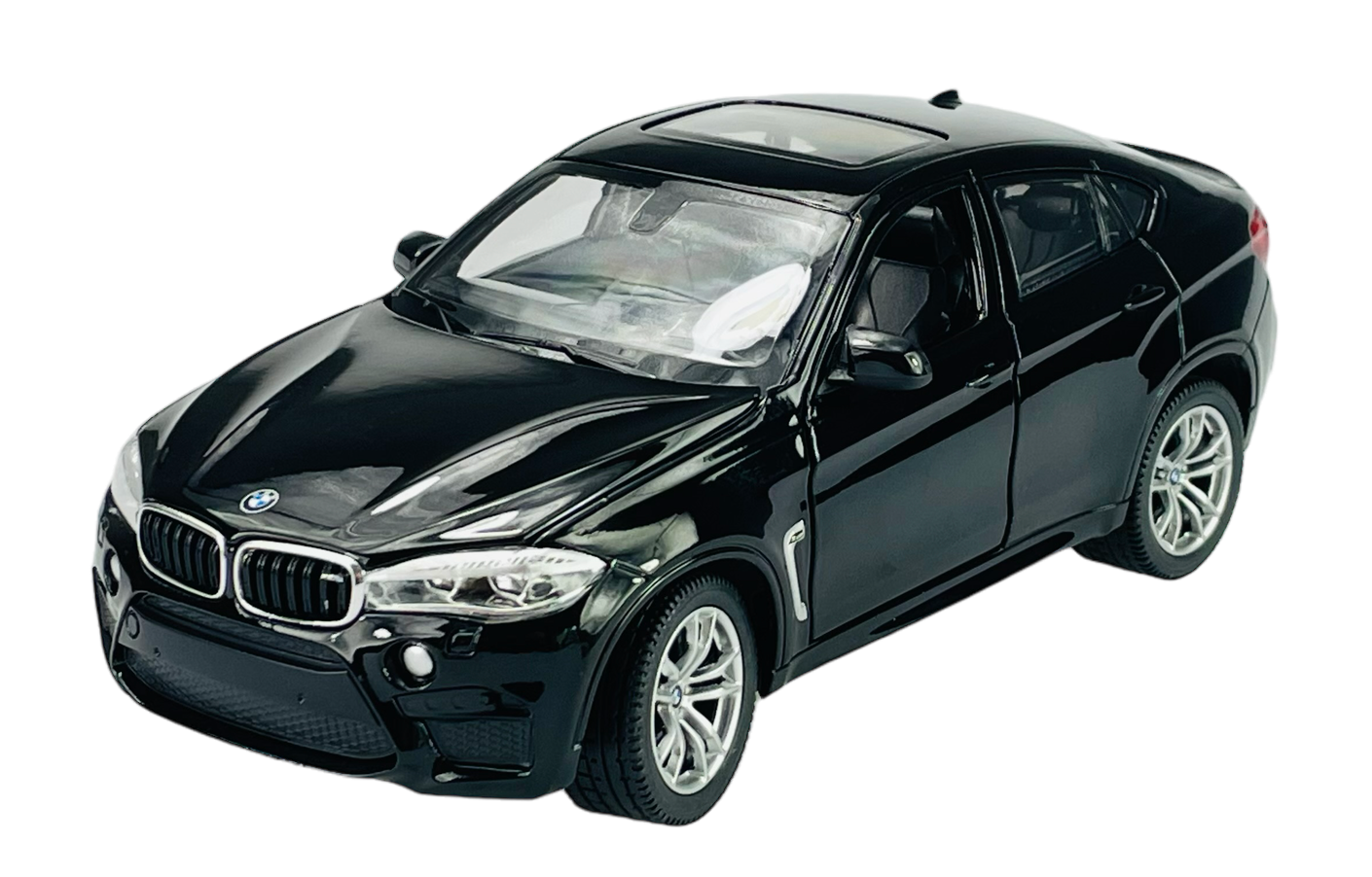 Czarny model samochodu BMW X6M w skali 1:24 z widocznymi detalami, takimi jak reflektory i felgi. Model wykonany z metalu, z realistycznym wykończeniem karoserii.