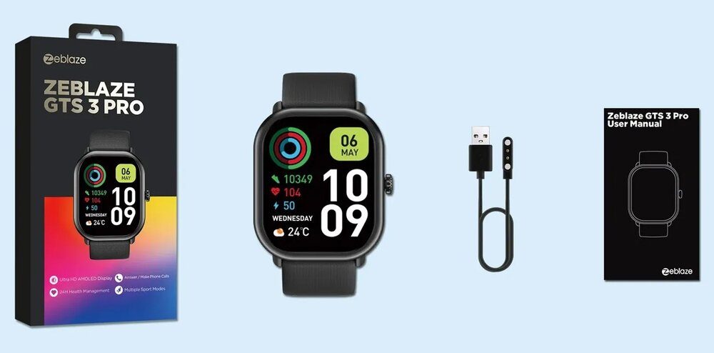 Na obrazie znajduje się opakowanie, smartwatch z kolorowym wyświetlaczem, kabel USB oraz instrukcja obsługi. Na opakowaniu widnieje napis \'ZEBLAZE GTS 3 PRO\'.