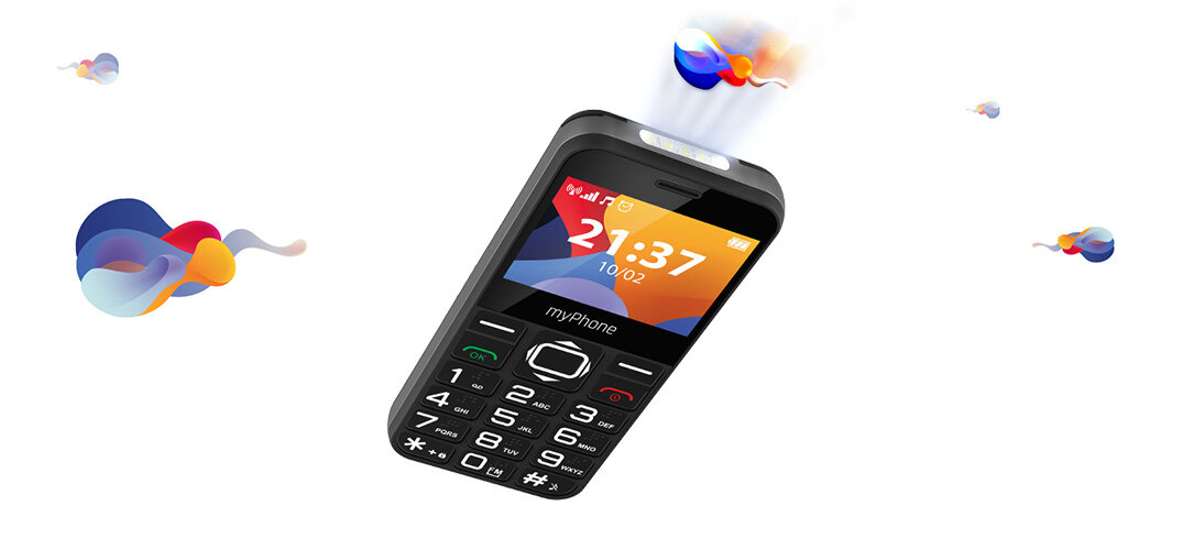 Na obrazie widoczny jest telefon komórkowy z dużymi przyciskami i wyświetlaczem pokazującym godzinę 21:37 oraz datę 10.02. Telefon jest w kolorze czarnym z czerwonymi i zielonymi przyciskami oraz napisem \'myPhone\' pod ekranem.