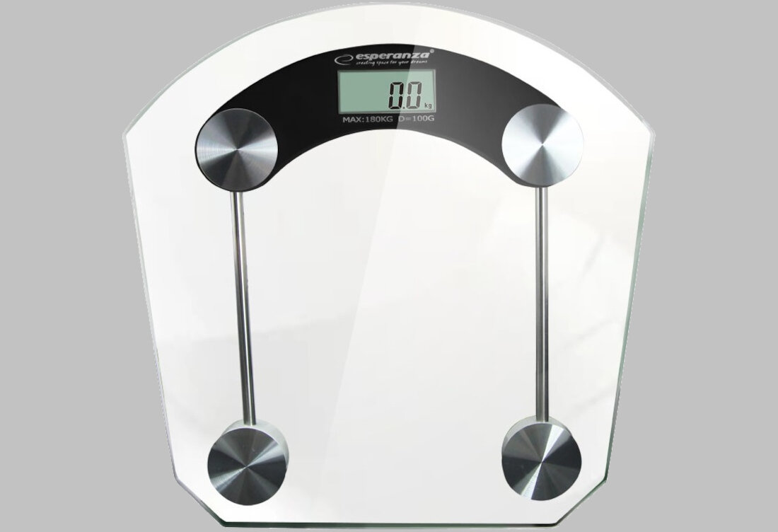 Szklana waga łazienkowa z wyświetlaczem cyfrowym pokazującym \'0.0\'. Na górze widoczne jest logo \'esperanza\', a poniżej napis \'MAX: 180KG D=100G\'.