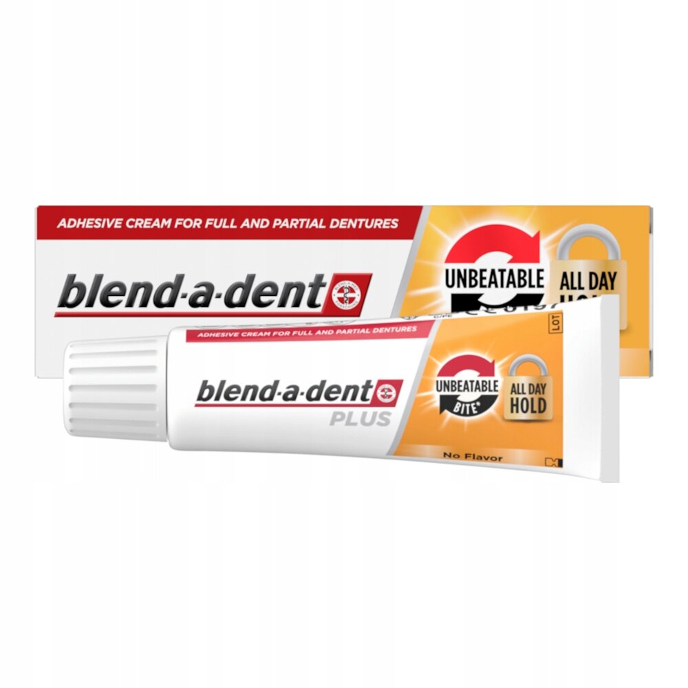 Na obrazie widoczna jest tubka kleju mocującego do protez blend-a-dent Plus oraz jej opakowanie. Na opakowaniu znajduje się napis \'UNBEATABLE BITE\' oraz \'ALL DAY HOLD\'.