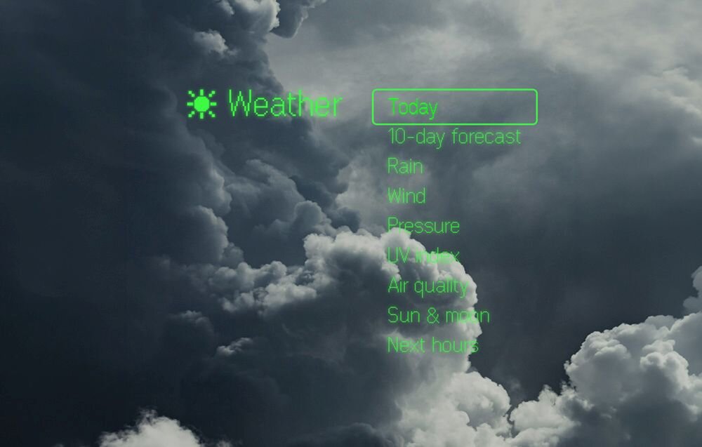 Na tle ciemnych chmur widoczny jest zielony tekst: \'Weather\', \'Today\', \'10-day forecast\', \'Rain\', \'Wind\', \'Pressure\', \'UV index\', \'Air quality\', \'Sun & moon\', \'Next hours\'.