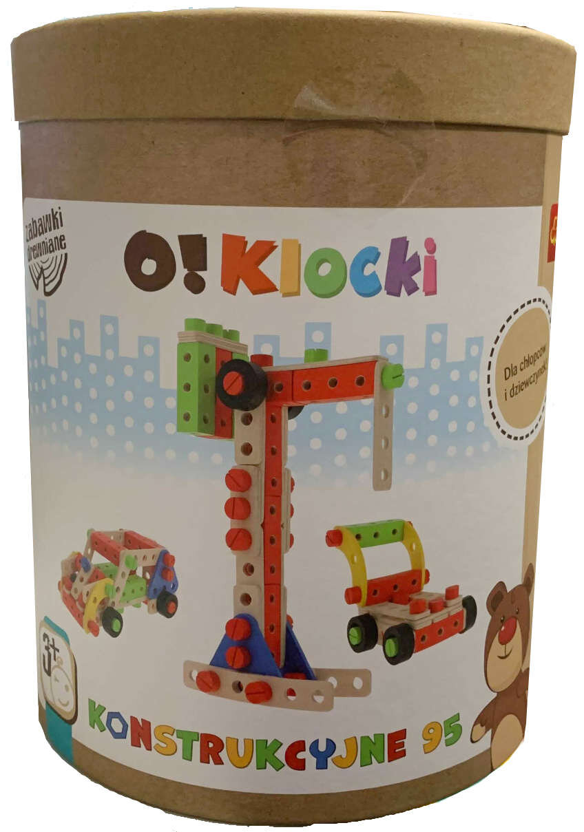 Opakowanie z tektury z etykietą przedstawiającą kolorowe klocki konstrukcyjne w formie dźwigu i pojazdów. Na etykiecie widnieje napis: \'O!Klocki KONSTRUKCYJNE 95\'.
