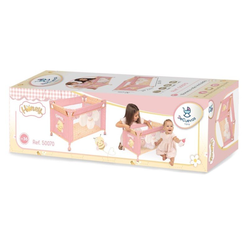 Opakowanie produktu z ilustracją różowego łóżeczka dla lalek z motywem pszczółki. Widoczne logo \'DeCuevas Toys\' oraz napis \'Ref. 50070\'.