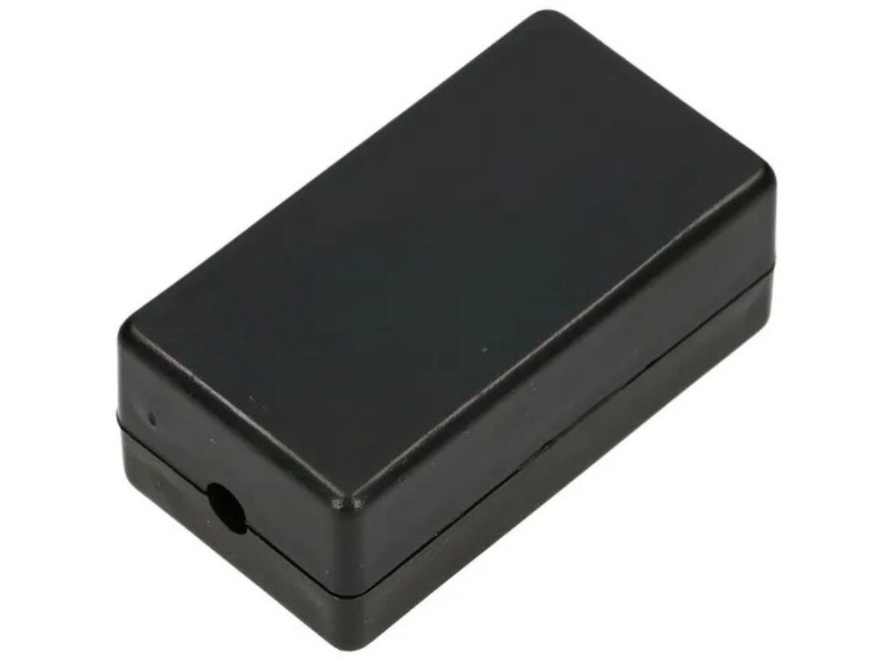 Puszka połączeniowa EXTRALINK EX.9588 Czarna, prostokątna obudowa z tworzywa sztucznego z małym, okrągłym otworem na kabel na krótszym boku