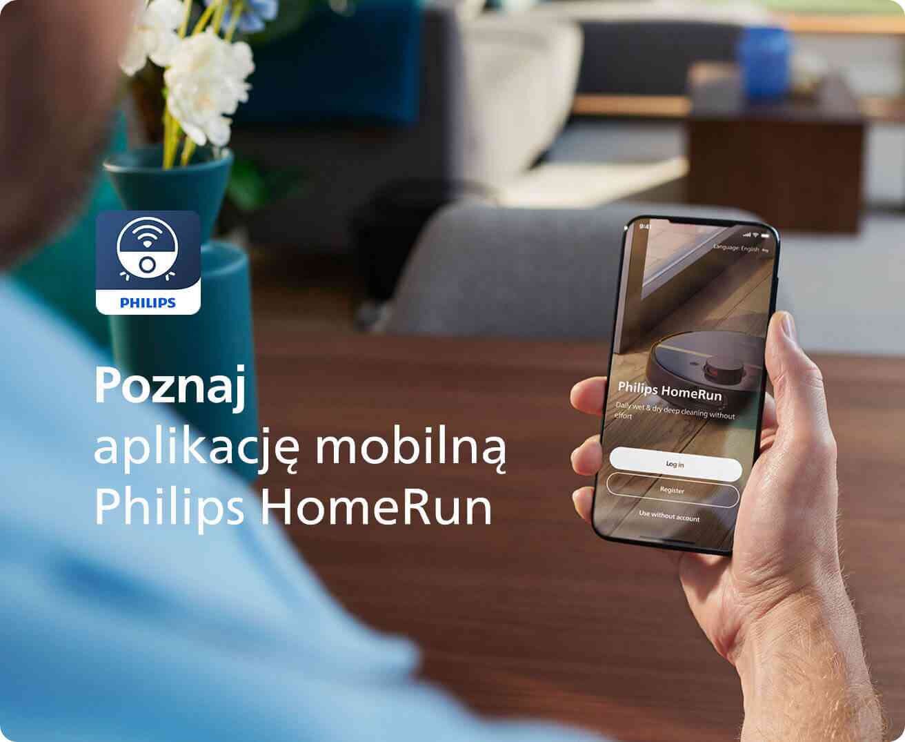 Osoba trzyma smartfon z aplikacją Philips HomeRun na ekranie. Obok widoczny jest tekst: \'Poznaj aplikację mobilną Philips HomeRun\' oraz logo PHILIPS.