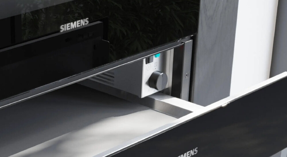 SZUFLADA SIEMENS BI510CNR0 Zbliżenie na pokrętło regulacji temperatury i panel sterowania szuflady grzewczej SIEMENS 40-80°C regulacja temperatury rozmrażanie podtrzymywanie ciepła nagrzewanie