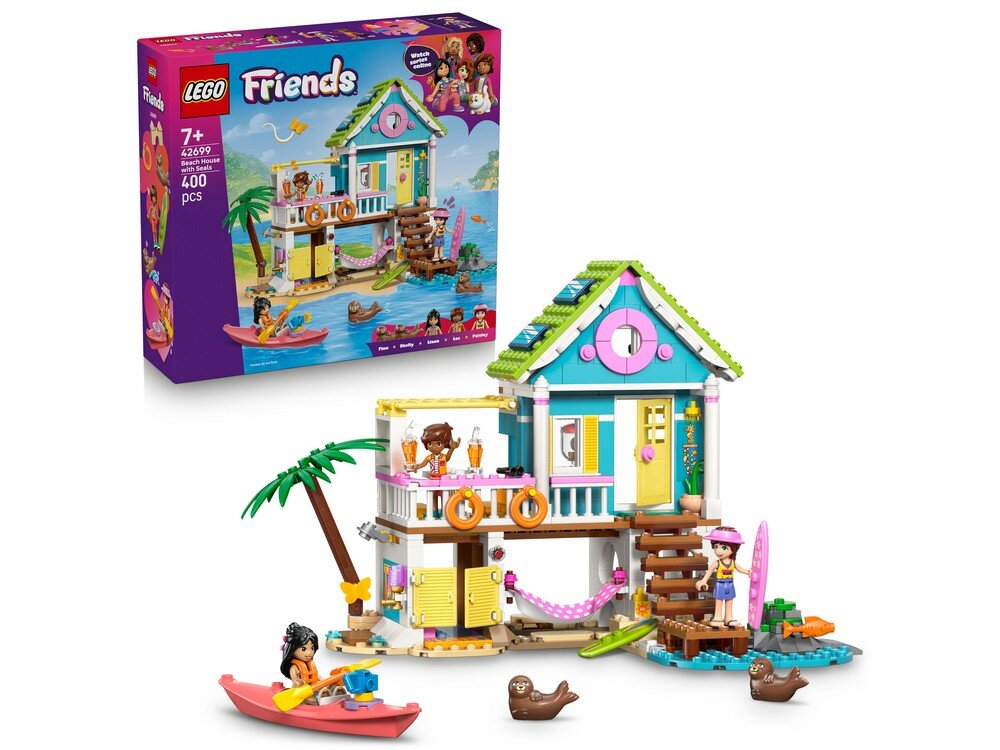 Zestaw LEGO przedstawiający kolorowy domek na plaży z fokami, z widocznymi figurkami i akcesoriami. W tle pudełko z napisem \'LEGO Friends 7+ 42699 400 pcs\'.