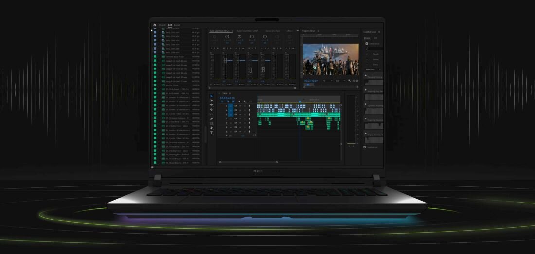 Laptop z wyświetlaczem pokazującym interfejs edytora wideo z wieloma ścieżkami i oknami podglądu. Tło jest ciemne z subtelnymi efektami świetlnymi wokół urządzenia.